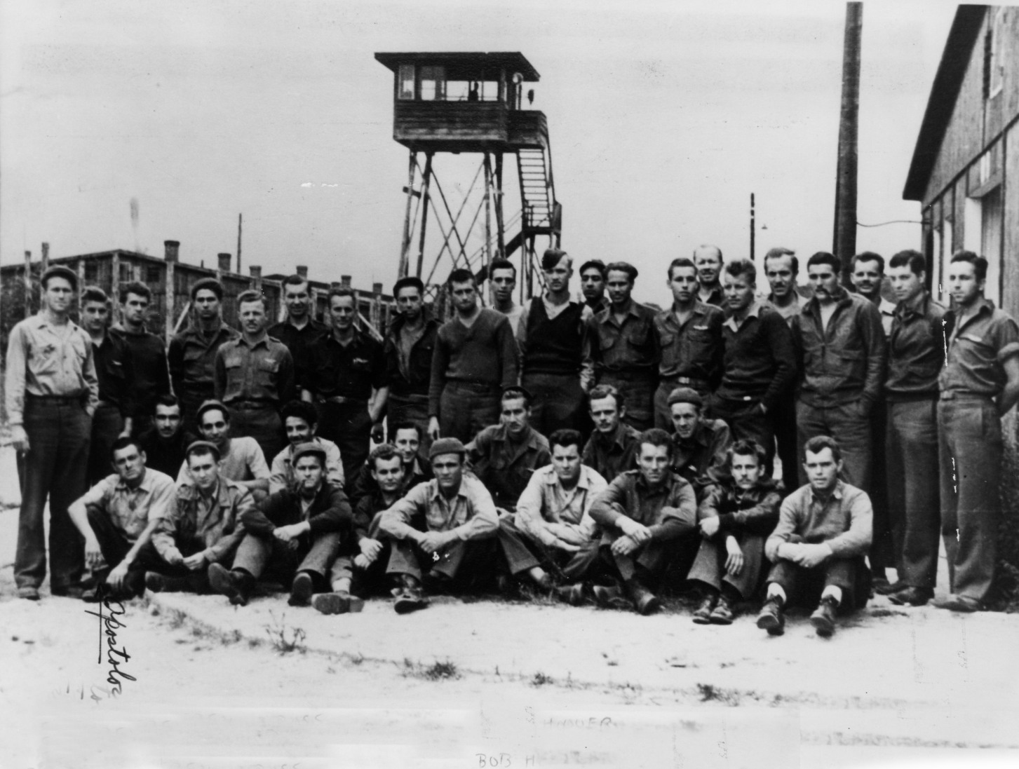 Aircrew with a parachute canopy, smiling